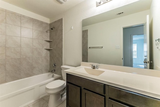 full bathroom featuring bathtub / shower combination, toilet, vanity, visible vents, and tile patterned floors