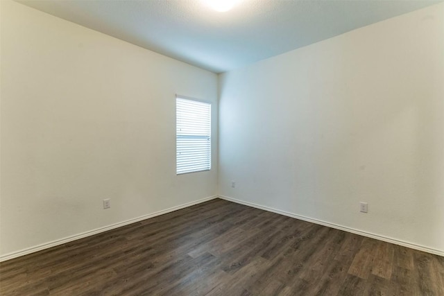 470 Major Lee Ln, Jarrell, TX 76537 - empty room with dark wood-style flooring and baseboards