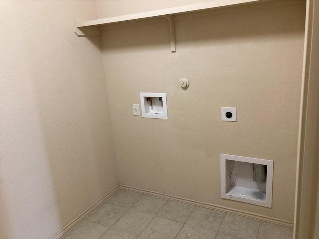 washroom with laundry area, baseboards, hookup for a gas dryer, hookup for a washing machine, and hookup for an electric dryer