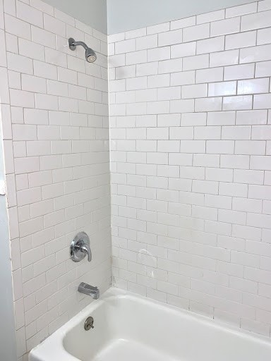 full bathroom with shower / bath combination