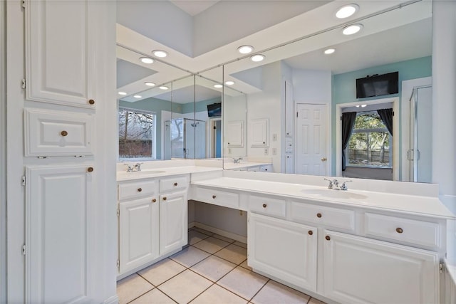 full bathroom featuring tile patterned floors, recessed lighting, an enclosed shower, and vanity