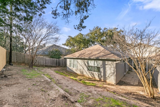 view of outbuilding featuring a fenced backyard