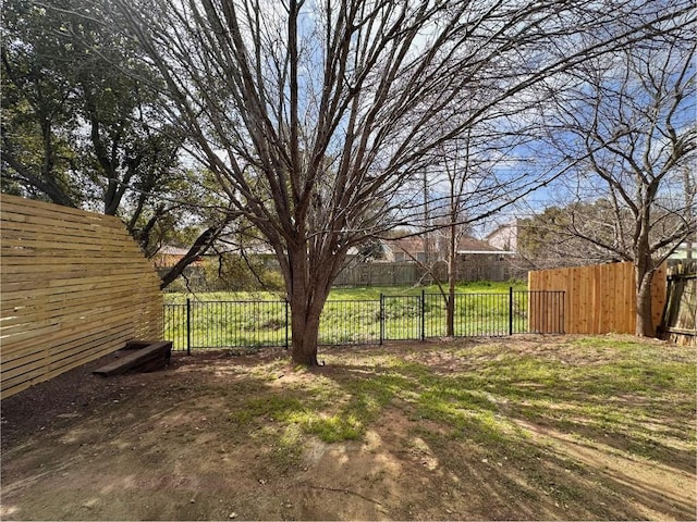 view of yard with fence