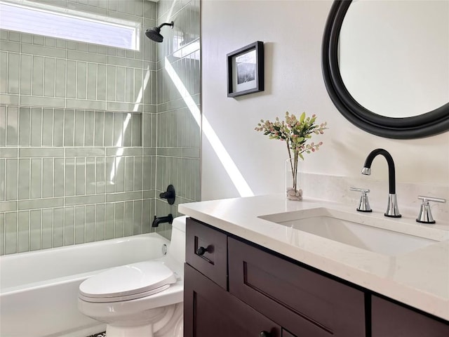 full bathroom with vanity, toilet, and shower / tub combination