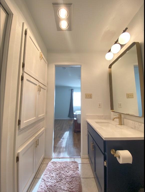 bathroom featuring vanity and tile patterned floors