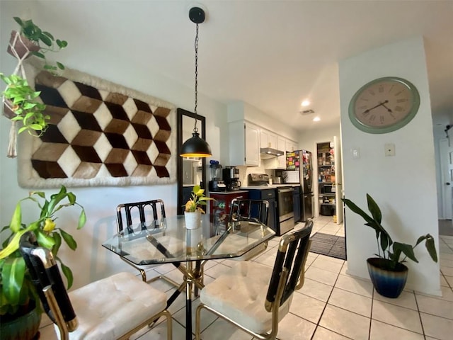 dining space with light tile patterned floors, visible vents, and recessed lighting