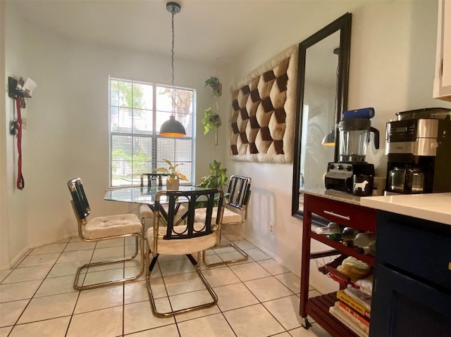 dining space with light tile patterned flooring