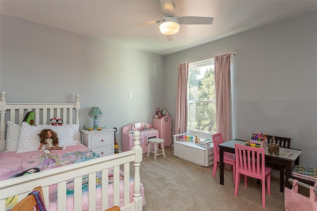 carpeted bedroom with ceiling fan