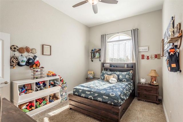 bedroom featuring carpet flooring, a ceiling fan, and baseboards