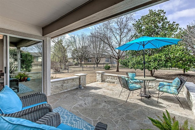 view of patio / terrace with fence