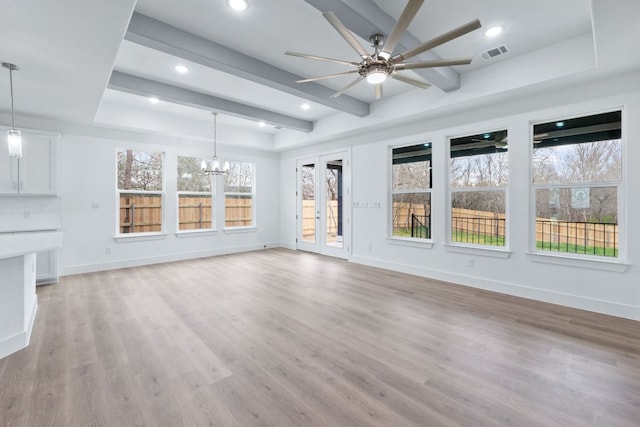 interior space featuring french doors, visible vents, beamed ceiling, and ceiling fan with notable chandelier