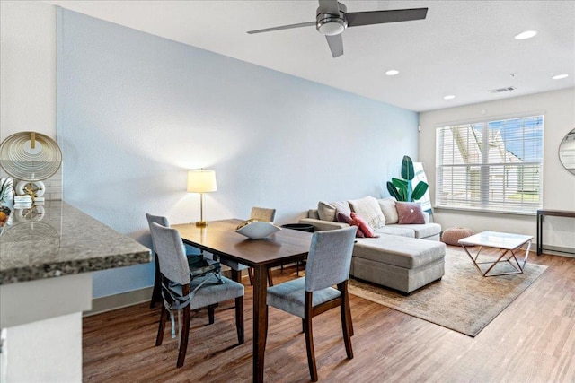 12185 Chelsea Glen Place Br, Austin, TX 78753 - dining room with wood finished floors, ceiling fan, baseboards, and recessed lighting