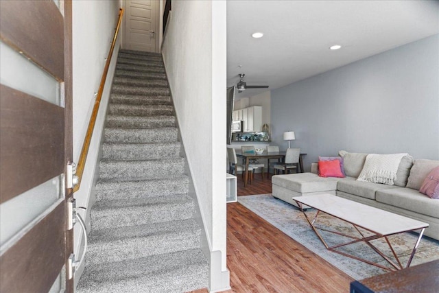 12185 Chelsea Glen Place Br, Austin, TX 78753 - stairs with wood finished floors, ceiling fan, and recessed lighting