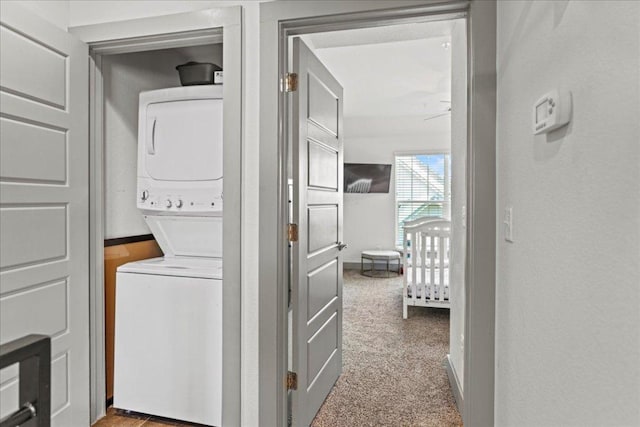 12185 Chelsea Glen Place Br, Austin, TX 78753 - laundry area with estacked washer and dryer and carpet flooring