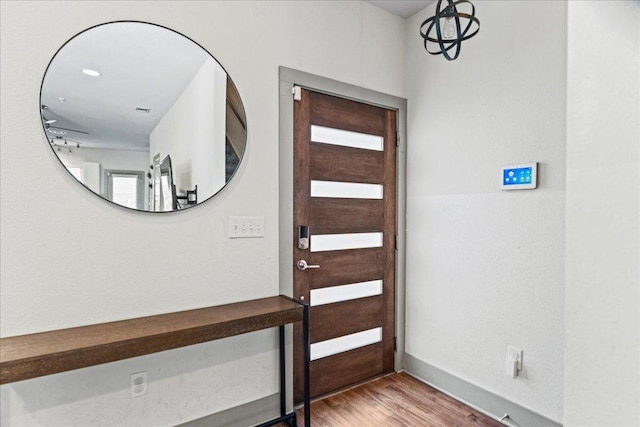 12185 Chelsea Glen Place Br, Austin, TX 78753 - foyer entrance with wood finished floors and baseboards