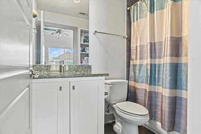 12185 Chelsea Glen Place Br, Austin, TX 78753 - bathroom with a textured wall, vanity, toilet, and a shower with curtain