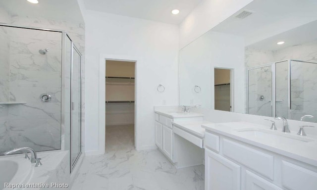 full bath with vanity, visible vents, marble finish floor, a marble finish shower, and a bathtub