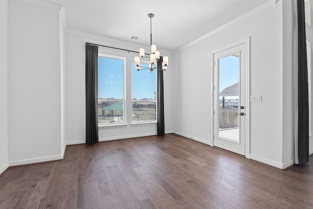 unfurnished dining area with a chandelier, dark wood-type flooring, visible vents, and crown molding