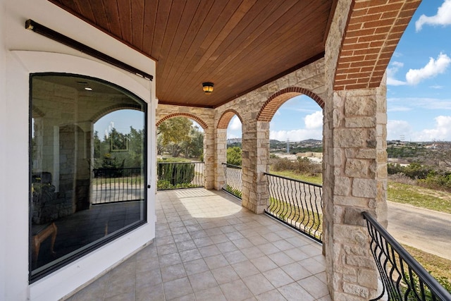 view of patio / terrace with a balcony