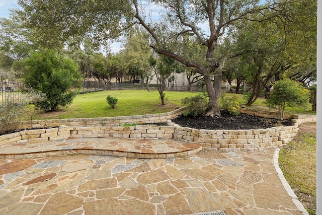 view of patio featuring fence