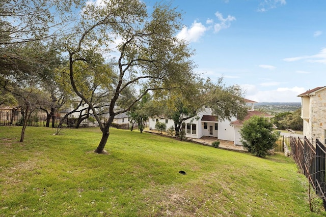 view of yard with fence