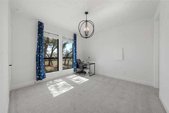 interior space featuring a notable chandelier, carpet floors, and baseboards
