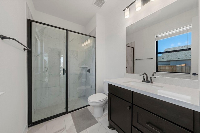 bathroom featuring visible vents, a marble finish shower, toilet, and vanity