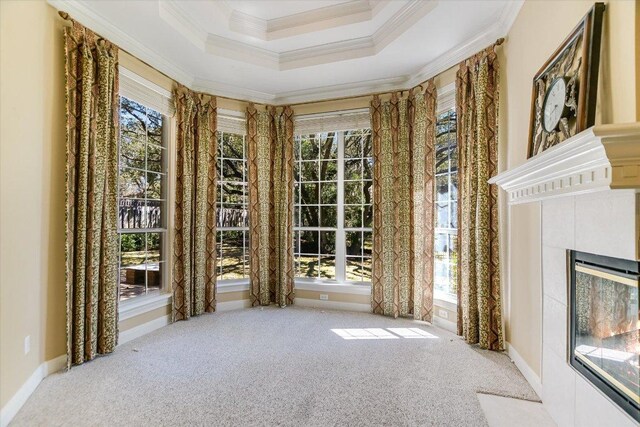 10513 Indigo Broom Loop, Austin, TX 78733 - carpeted empty room with crown molding and a fireplace with flush hearth