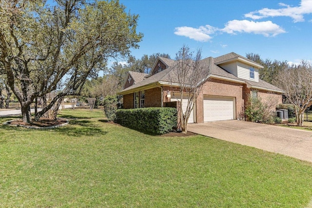 view of side of home with an attached garage, central air condition unit, brick siding, a yard, and driveway