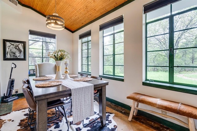 dining room featuring wood ceiling, visible vents, vaulted ceiling, and baseboards