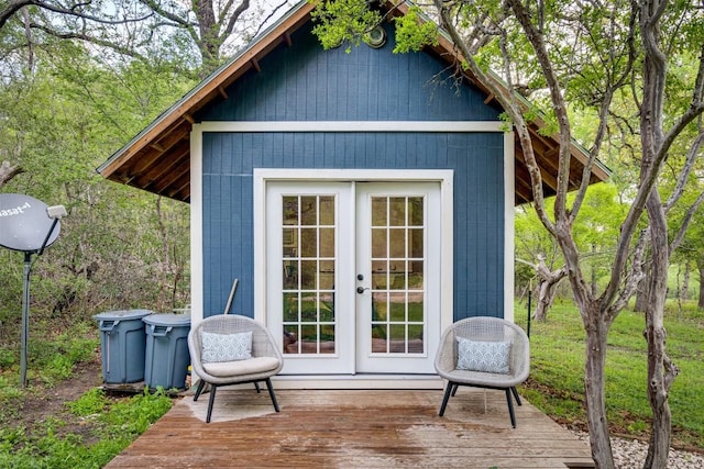 view of outbuilding with french doors and an outdoor structure