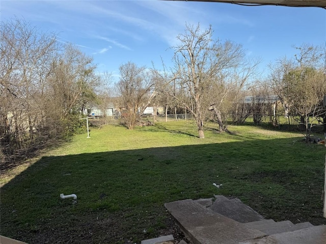 view of yard featuring fence