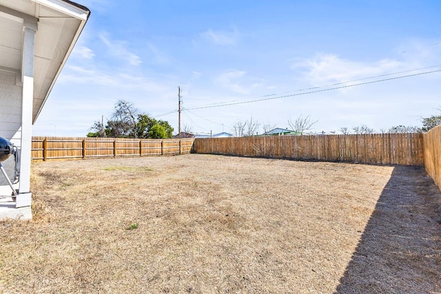 view of yard featuring a fenced backyard