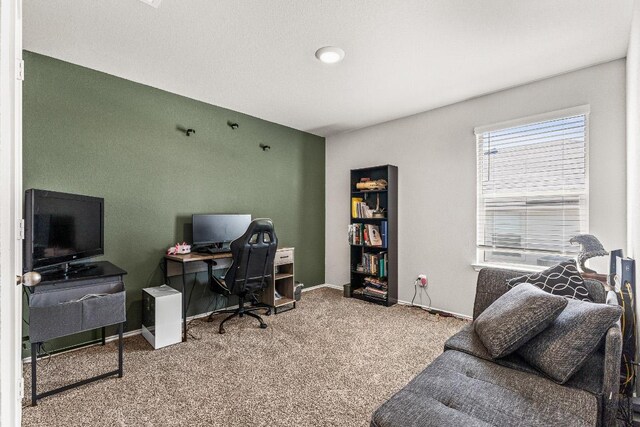 office area featuring carpet floors and baseboards