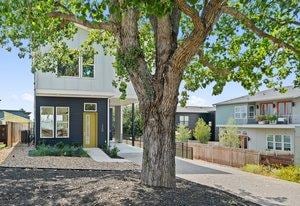 view of front of property featuring fence