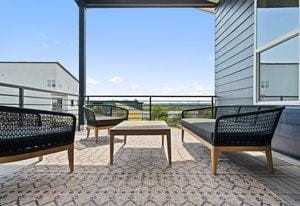 balcony with an outdoor hangout area