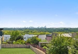 view of yard with a vegetable garden and fence