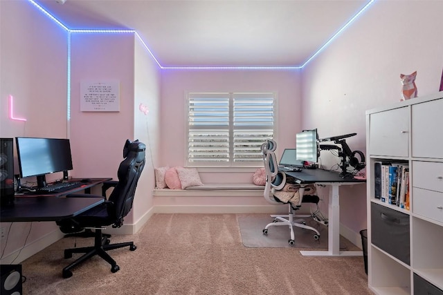 carpeted office with baseboards and ornamental molding