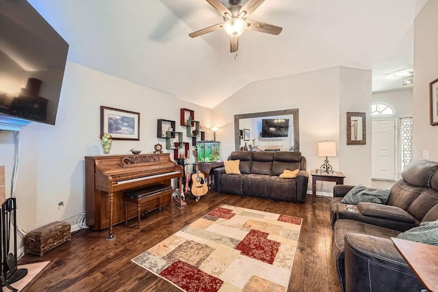 living area with baseboards, a ceiling fan, vaulted ceiling, and wood finished floors