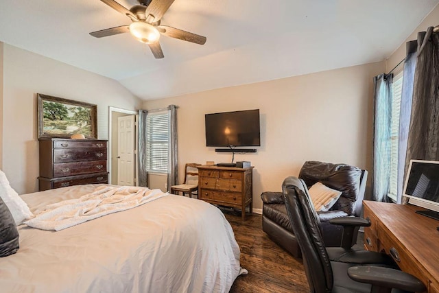 bedroom with lofted ceiling, ceiling fan, dark wood-style floors, and baseboards