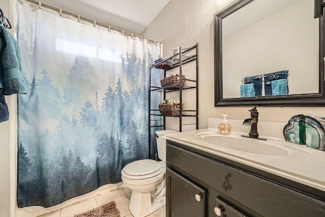 bathroom with vanity, tile patterned flooring, toilet, and a shower with curtain