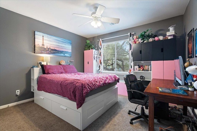 bedroom featuring a ceiling fan, carpet, and baseboards