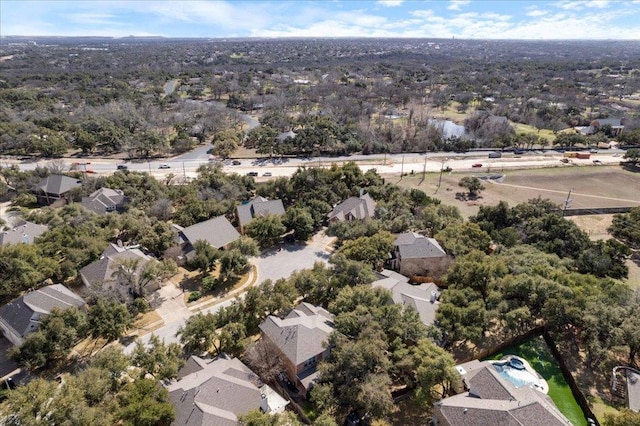 birds eye view of property with a residential view