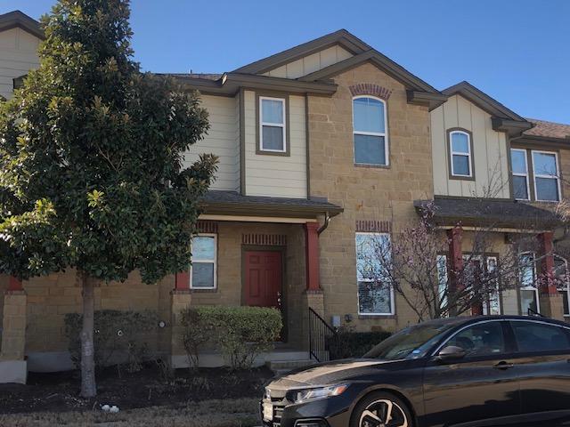 multi unit property featuring stone siding