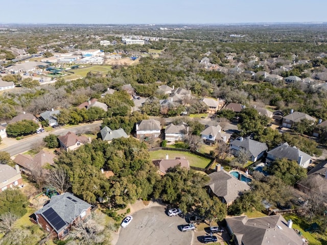 birds eye view of property with a residential view