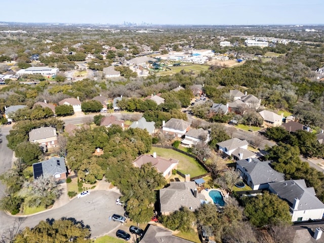 birds eye view of property with a residential view