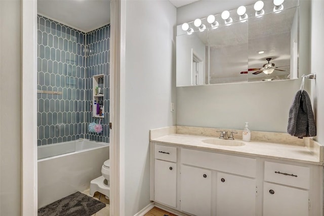 full bathroom with toilet, ceiling fan, shower / bathing tub combination, and vanity