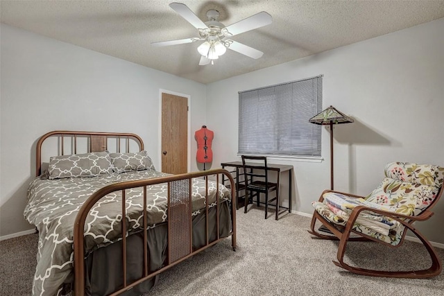 bedroom featuring carpet flooring, ceiling fan, a textured ceiling, and baseboards