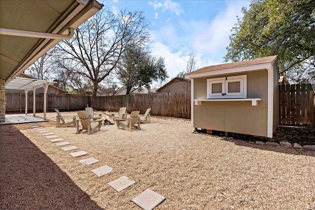 12306 Hickorystick Cv, Austin, TX 78750 - view of yard with an outbuilding, a fenced backyard, a patio area, and a shed