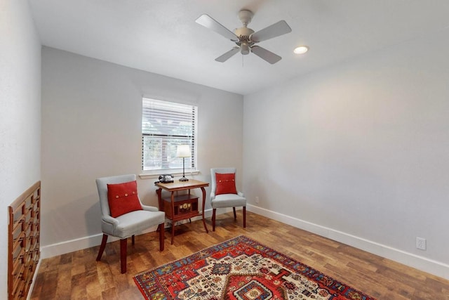 sitting room featuring recessed lighting, a ceiling fan, baseboards, and wood finished floors